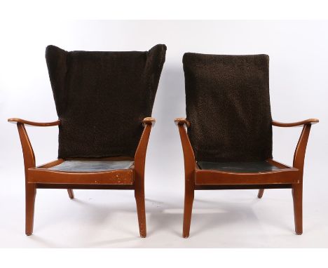 Pair of Pirelli armchairs, the teak chairs with angled arms and arched legs and Pirelli rubber seat bases, attributed to Toot