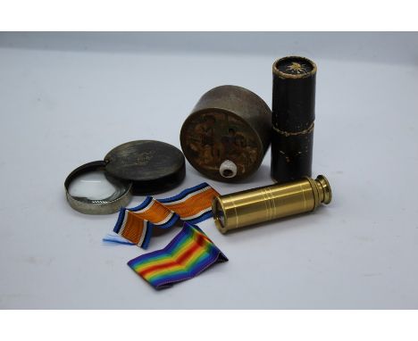 Works of art, consisting of brass four draw telescope, swiss manual music box, folding magnifying glass with horn case initia