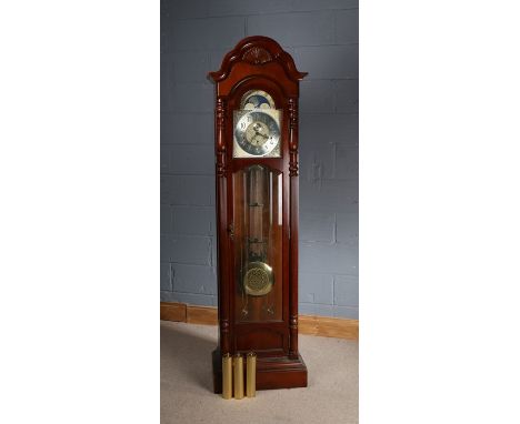 Sligh mahogany longcase clock, the arch pediment above an arched glazed door with bevelled glass, flanked by fluted columns, 