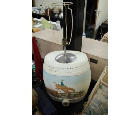 Porcelain Whisky barrel, decorated with a huntswoman, horse and hound jumping a gate, now converted to a lamp