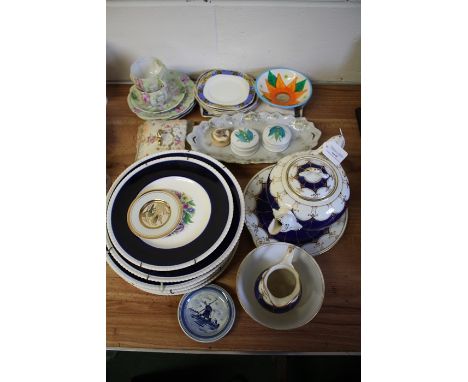 Porcelain to include a Dutch Delft style dish, Austrian teacups and saucers, Clarice Cliff style bowl, Lawley's saucers and t