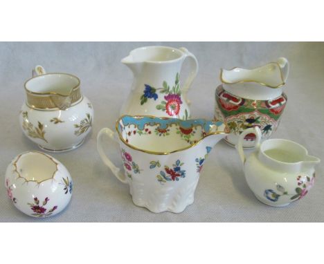 A small collection of Royal Worcester retrospective porcelain jugs and other small items of porcelain.