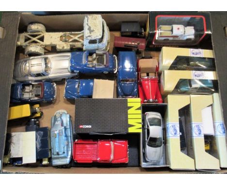 A box containing a quantity of miscellaneous toys, to include: two Corgi Mini Cooper, various models of the Morris Minor, a M