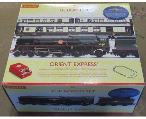 A Hornby boxed set Orient Express, comprising: United States Lines Merchant Navy Class Locomotive, together with three Pulman