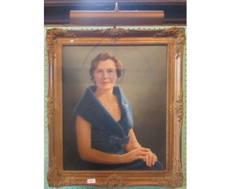 J Lawrence Baker, a mid-20th century gilt framed oil on canvas, portrait of an elegant lady, signed and dated, 59 x 49cm.
