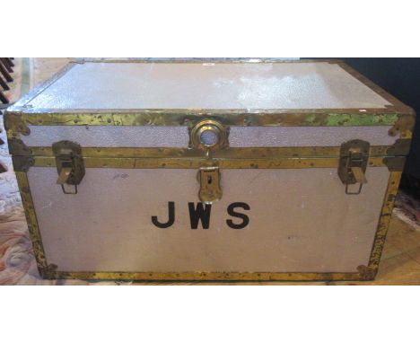 A contemporary metal and brass bound trunk, bearing the initials JWS.