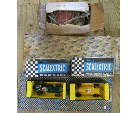 A small quantity of Tri-ang Scalextric track, a Cooper racing car, together with a BRM model racing car.