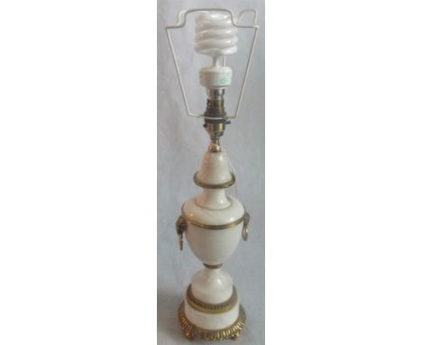 A single marble and gilt metal table lamp.