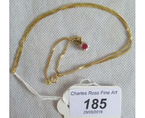 A 9ct gold and ruby necklace.