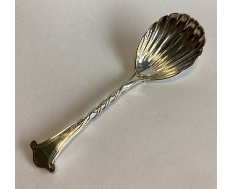 A heavy Victorian silver caddy spoon with fluted bowl and twisted stem. London 1871. Approx. 25 grams.