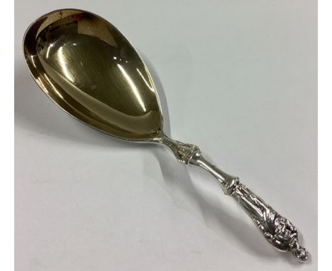 A heavy silver gilt Apostle top caddy spoon of typical form. Sheffield 1866. By TB. Approx. 16 grams.