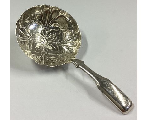 A good quality Victorian silver caddy spoon with bright-cut decoration. Birmingham. By Hilliard & Thomason. Approx. 10 grams.