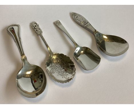 A group of three modern silver caddy spoons together with a plated example. Approx. 65 grams of gross weight.