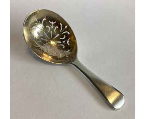 A good Georgian silver caddy spoon with pierced gilded bowl. London. By GN. Approx. 10 grams.