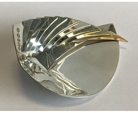 A heavy stylish silver caddy scoop of textured form. Birmingham 2017. By Karina Gill. Approx. 46 grams.