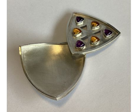 A heavy stylish silver caddy spoon of shaped form. London 2019. By LCN. Approx. 31 grams.