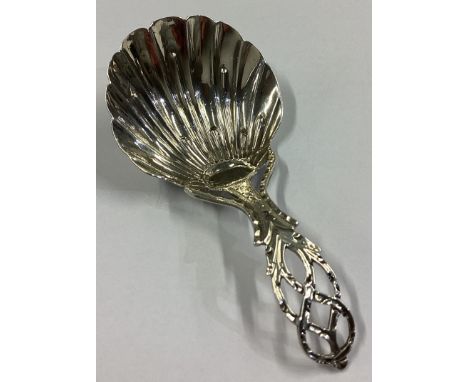 A good Georgian silver caddy spoon with pierced decoration. London. Approx. 11 grams.