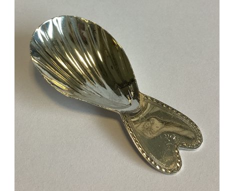 An unusual heart-shaped Georgian silver caddy spoon with fluted bowl. London 1794. By TN&GB. Approx. 12 grams.