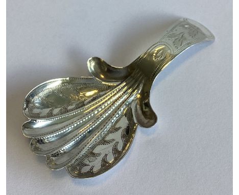 A good Georgian silver caddy spoon of shaped form with bright-cut decoration. Birmingham 1830. By JH. Approx. 3 grams.
