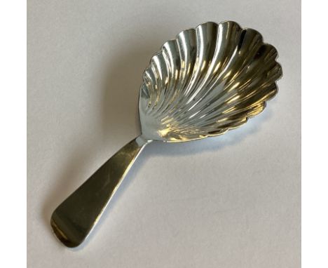 EXETER: A good silver OE pattern caddy spoon with fluted bowl. By Isaac Parkin. Approx. 13 grams.