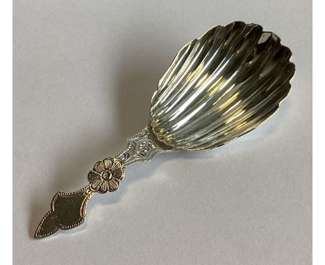 A good quality engraved Victorian silver caddy spoon with fluted bowl. London 1887. By Cocks & Betteridge. Approx. 9 grams.