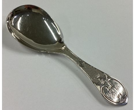 An attractive engraved Victorian silver caddy spoon. Birmingham 1860. By George Unite. Approx. 10 grams.