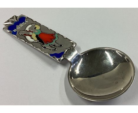 DAVID ANDERSEN: A large silver and enamelled caddy spoon depicting a couple dancing. Approx. 32 grams.