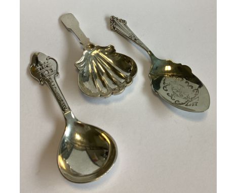 Two modern silver caddy spoons together with a plated example. Approx. 58 grams of gross weight.