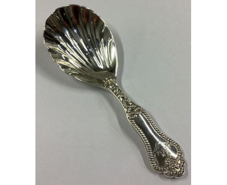 A good Victorian silver caddy spoon with beaded decoration. London 1862. George Adams. Approx. 22 grams.