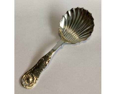 EDINBURGH: A large silver Kings' pattern caddy spoon with fluted bowl. By PA. Approx. 18 grams.