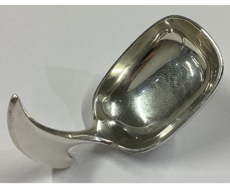 A stylish silver caddy spoon. Marked Sterling. Approx. 38 grams.