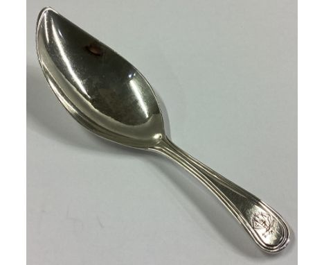 A stylish shaped silver caddy spoon with reeded decoration. London. By JM. Approx. 10 grams.