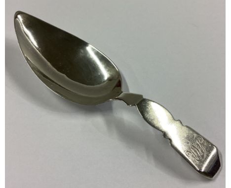 A stylish shaped Georgian silver caddy spoon. London 1808. By JW. Approx. 10 grams.