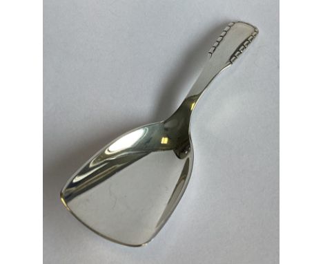 GEORG JENSEN: A good heavy silver caddy spoon of stylised form. Marked verso. Approx. 23 grams.