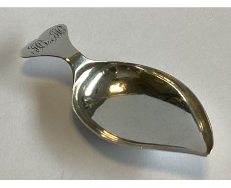A Georgian silver leaf-shaped caddy spoon with heart thumbpiece. Birmingham 1807. By WP. Approx. 9 grams.