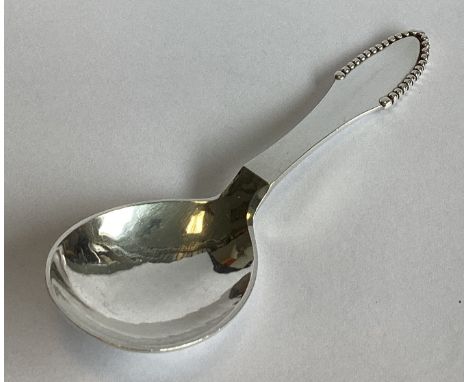 GEORG JENSEN: A good heavy silver caddy spoon of stylised form. Marked verso. Approx. 35 grams.