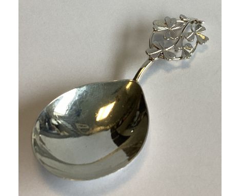 CHESTER: An unusual fine silver caddy spoon with clover decoration. By MF. Approx. 17 grams.