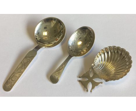 A group of three silver caddy spoons. Various dates and makers. Approx. 47 grams.