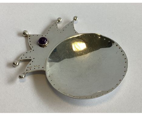 An unusual large circular silver caddy spoon in the form of jester's hat. London 1996. By RP. Approx. 16 grams.