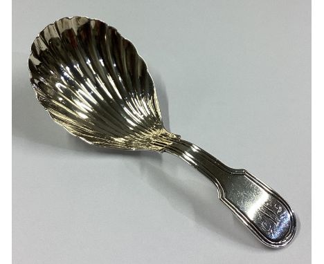 A good silver fiddle thread caddy spoon with fluted bowl. London 1800. By EM. Approx. 13 grams.