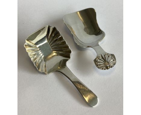 A heavy Georgian silver caddy spoon. London. By GF. Together with another silver caddy spoon. Approx. 22 grams.