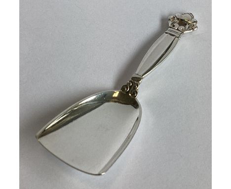 GEORG JENSEN: A good heavy silver caddy spoon of stylised form. Marked verso. Approx. 27 grams.