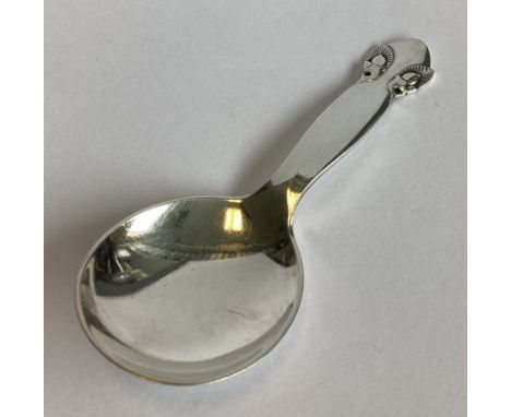 GEORG JENSEN: A good heavy silver caddy spoon of stylised form. Marked verso. Approx. 31 grams.