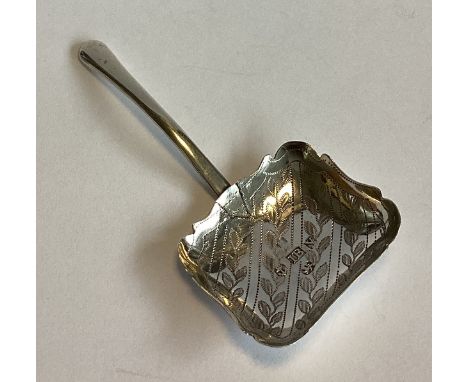 An early silver caddy spoon with bright-cut leaf decoration. Birmingham 1822. By IB. Approx. 8 grams.