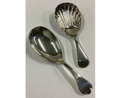 Two heavy Modernistic silver caddy spoons. Various dates and makers. Approx. 33 grams.