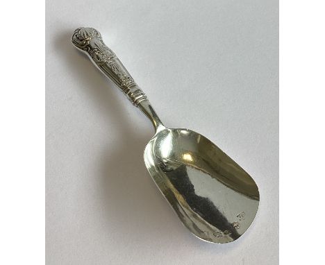 A silver Kings' pattern caddy scoop of plain form. Birmingham. By IT. Approx. 14 grams.