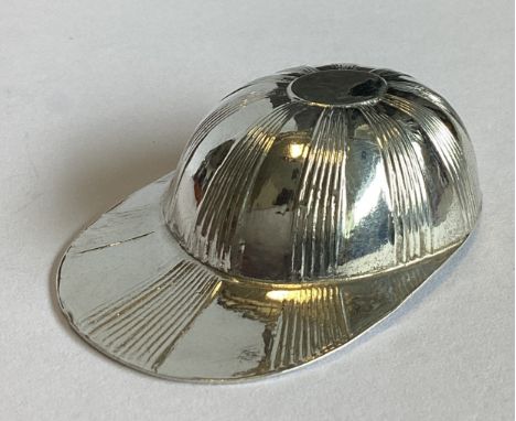A good Georgian silver caddy spoon in the form of a jockey cap with reeded decoration. Birmingham 1739. Approx. 9 grams.