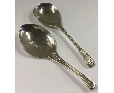 Two heavy Scottish silver caddy spoons of tapering form. Various dates and makers. Approx. 33 grams.