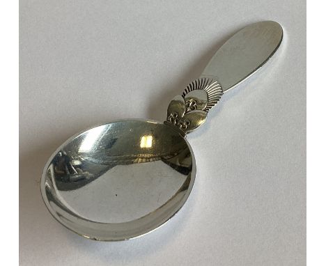 GEORG JENSEN: A good heavy silver caddy spoon of stylised form. Marked verso. Approx. 28 grams.