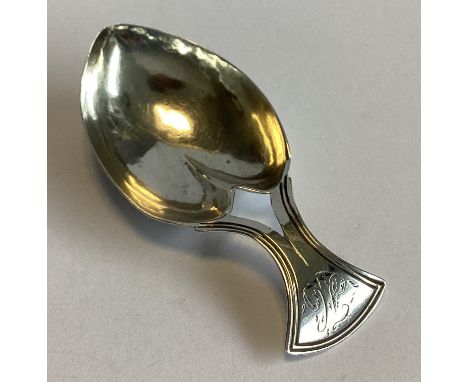 An unusual Georgian silver heart-shaped caddy spoon with bright-cut decoration. Birmingham. By Joseph Wilmore. Approx. 10 gra